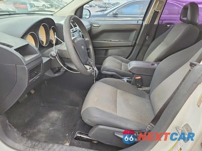 Zdjęcie 7 z 13 samochodu: 2009 DODGE CALIBER SXT VIN:1B3HB48A29D196886 - miniatura