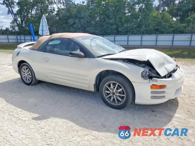 Czwarte zdjęcie samochodu z boku: 2001 MITSUBISHI ECLIPSE SPYDER GS VIN:4A3AE35G41E007421 - miniatura