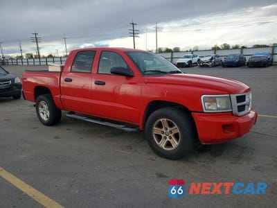 Czwarte zdjęcie samochodu z boku: 2011 DODGE DAKOTA SLT VIN:1D7RW3GK2BS525704 - miniatura