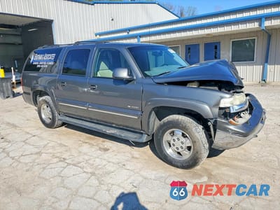 Czwarte zdjęcie samochodu z boku: 2000 CHEVROLET SUBURBAN K1500 VIN:3GNFK16T4YG124962 - miniatura