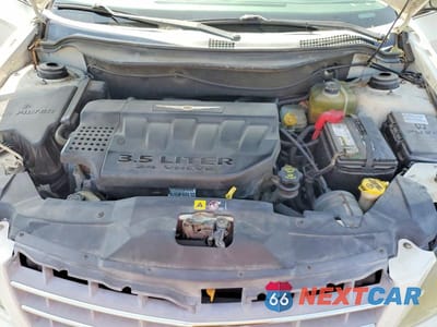 Zdjęcie 12 z 13 samochodu: 2005 CHRYSLER PACIFICA TOURING VIN:2C4GM68425R353527 - miniatura