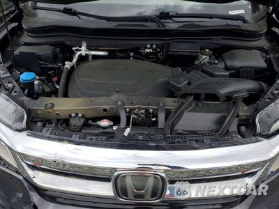 Zdjęcie 12 z 13 samochodu: 2020 HONDA PILOT TOURING VIN:5FNYF5H99LB007973 - miniatura