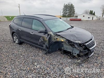 Czwarte zdjęcie samochodu z boku: 2015 CHEVROLET TRAVERSE LS VIN:1GNKRFED8FJ282573 - miniatura
