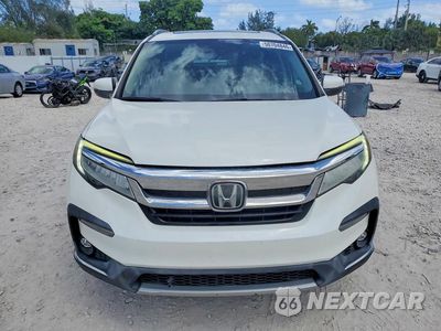 Piąte zdjęcie samochodu w środku: 2019 HONDA PILOT TOURING VIN:5FNYF5H90KB012980 - miniatura