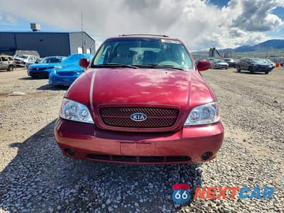 Piąte zdjęcie samochodu w środku: 2004 KIA SEDONA LX VIN:KNDUP131546570831 - miniatura