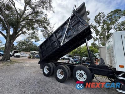 Zdjęcie 12 z 12 samochodu: 2003 VOLVO VHD DUMP TRUCK VIN:4V5KC9GH33N347488 - miniatura