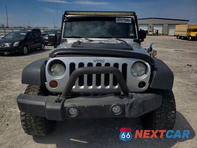 Piąte zdjęcie samochodu w środku: 2010 JEEP WRANGLER UNLIMITED SPORT VIN:1J4BA3H14AL196958 - miniatura
