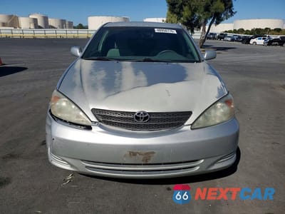 Piąte zdjęcie samochodu w środku: 2003 TOYOTA CAMRY LE V6 VIN:4T1BF30K03U046902 - miniatura