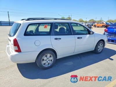 Trzecie zdjęcie samochodu z tyłu: 2006 FORD FOCUS VIN:1FAFP36N16W254824 - miniatura