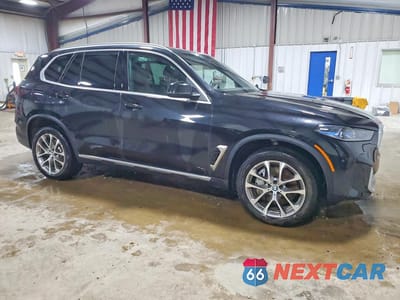 Czwarte zdjęcie samochodu z boku: 2026 BMW X5 XDRIVE50E VIN:5UX43EU08T9276201 - miniatura