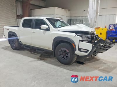 Czwarte zdjęcie samochodu z boku: 2025 NISSAN FRONTIER PRO-4X VIN:1N6ED1EK2SN611970 - miniatura