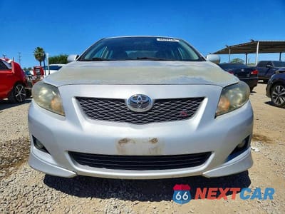 Piąte zdjęcie samochodu w środku: 2009 TOYOTA COROLLA S VIN:1NXBU40E69Z087937 - miniatura
