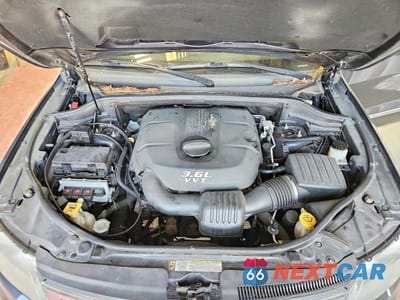 Zdjęcie 12 z 13 samochodu: 2013 JEEP GRAND CHEROKEE LAREDO VIN:1C4RJFAGXDC502683 - miniatura