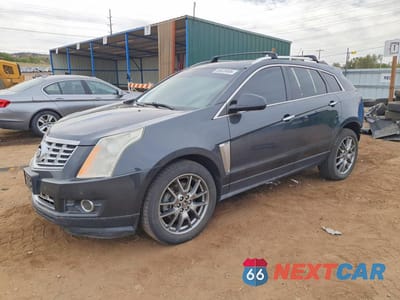 2015 CADILLAC SRX PREMIUM COLLECTION 3GYFNGE3XFS556349 - główne zdjęcie licytacji z USA - miniatura