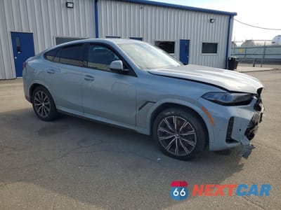Czwarte zdjęcie samochodu z boku: 2026 BMW X6 XDRIVE40I VIN:5UX33EX04T9192531 - miniatura