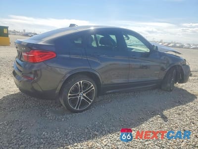 Trzecie zdjęcie samochodu z tyłu: 2015 BMW X4 XDRIVE35I VIN:5UXXW5C59F0E88649 - miniatura