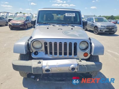 Piąte zdjęcie samochodu w środku: 2013 JEEP WRANGLER UNLIMITED SPORT VIN:1C4HJWDG3DL591052 - miniatura