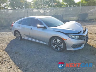 Czwarte zdjęcie samochodu z boku: 2017 HONDA CIVIC EX VIN:19XFC1F32HE200017 - miniatura