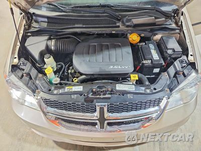 Zdjęcie 12 z 13 samochodu: 2015 DODGE GRAND CARAVAN SE VIN:2C4RDGBGXFR606192 - miniatura
