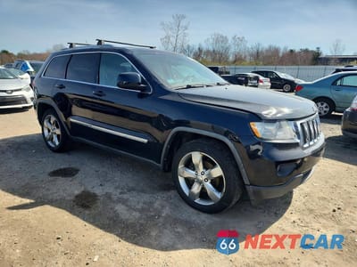 Czwarte zdjęcie samochodu z boku: 2012 JEEP GRAND CHEROKEE LAREDO VIN:1C4RJFAG1CC222049 - miniatura