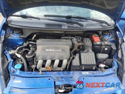 Zdjęcie 12 z 13 samochodu: 2007 HONDA FIT VIN:JHMGD38417S802906 - miniatura