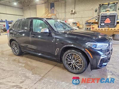 Czwarte zdjęcie samochodu z boku: 2020 BMW X5 VIN:5UXJU4C0XLLE45796 - miniatura