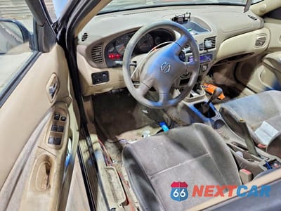 Zdjęcie 8 z 12 samochodu: 2003 NISSAN SENTRA XE VIN:3N1CB51DX3L817668 - miniatura