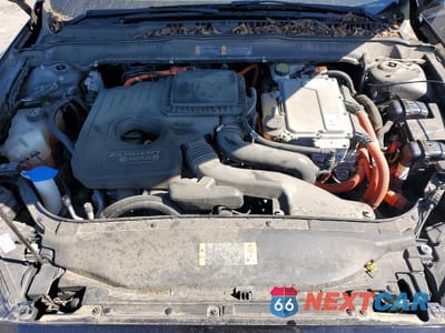 Zdjęcie 11 z 11 samochodu: 2013 FORD FUSION TITANIUM PHEV VIN:3FA6P0SU3DR332144 - miniatura