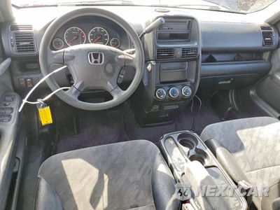 Zdjęcie 8 z 12 samochodu: 2004 HONDA CR-V EX VIN:JHLRD78804C024398 - miniatura