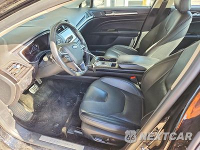 Zdjęcie 7 z 12 samochodu: 2018 FORD FUSION TITANIUM VIN:3FA6P0D92JR205664 - miniatura