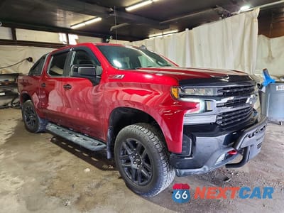 Czwarte zdjęcie samochodu z boku: 2021 CHEVROLET SILVERADO K1500 LT TRAIL BOSS VIN:3GCPYFED7MG400614 - miniatura