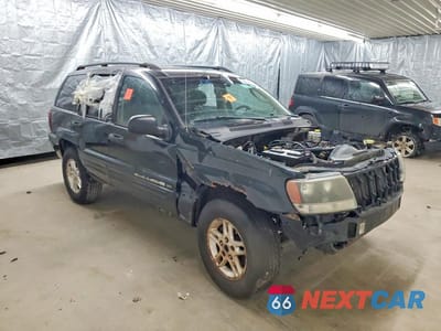 Czwarte zdjęcie samochodu z boku: 2002 JEEP GRAND CHEROKEE LAREDO VIN:1J4GW48S52C315852 - miniatura