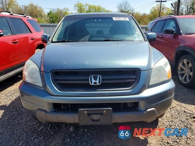 Piąte zdjęcie samochodu w środku: 2005 HONDA PILOT VIN:5FNYF18525B046798 - miniatura