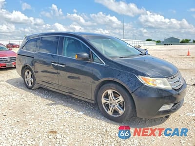 Czwarte zdjęcie samochodu z boku: 2012 HONDA ODYSSEY TOURING VIN:5FNRL5H9XCB115158 - miniatura