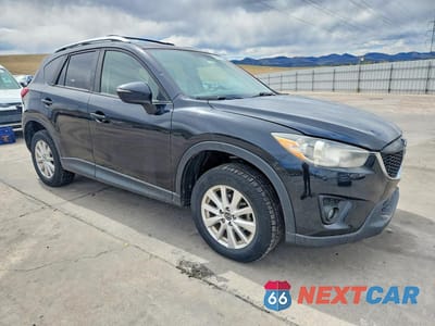 Czwarte zdjęcie samochodu z boku: 2015 MAZDA CX-5 TOURING VIN:JM3KE4CYXF0474833 - miniatura