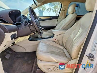 Zdjęcie 7 z 13 samochodu: 2015 LINCOLN MKC VIN:5LMCJ2A92FUJ38054 - miniatura
