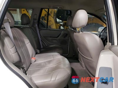 Zdjęcie 11 z 12 samochodu: 2002 JEEP GRAND CHEROKEE LAREDO VIN:1J4GW48N02C278400 - miniatura