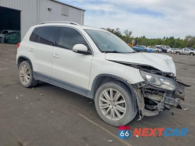Czwarte zdjęcie samochodu z boku: 2016 VOLKSWAGEN TIGUAN S VIN:WVGAV7AX2GW540964 - miniatura
