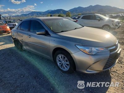 Czwarte zdjęcie samochodu z boku: 2015 TOYOTA CAMRY HYBRID LE VIN:4T1BD1FK9FU147412 - miniatura