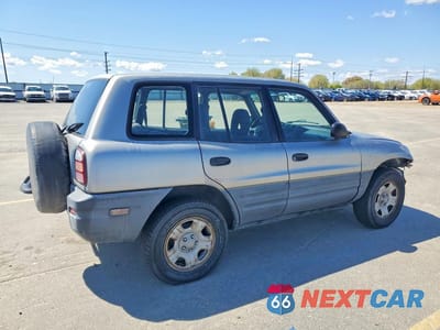 Trzecie zdjęcie samochodu z tyłu: 1999 TOYOTA RAV4 VIN:JT3HP10V2X7128567 - miniatura