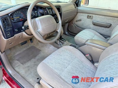 Piąte zdjęcie samochodu w środku: 1999 TOYOTA TACOMA BASE VIN:4TAPM62N6XZ488774 - miniatura