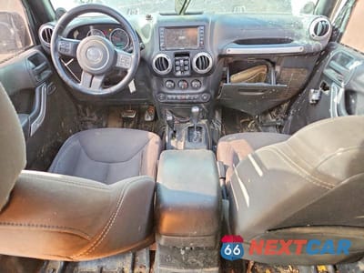 Zdjęcie 8 z 14 samochodu: 2014 JEEP WRANGLER UNLIMITED SAHARA VIN:1C4BJWEG9EL321555 - miniatura