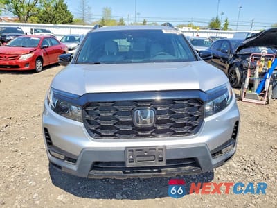 Piąte zdjęcie samochodu w środku: 2022 HONDA PASSPORT ELITE VIN:5FNYF8H0XNB011021 - miniatura