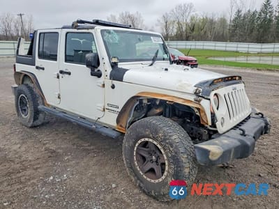 Czwarte zdjęcie samochodu z boku: 2016 JEEP WRANGLER UNLIMITED SPORT VIN:1C4BJWDG5GL342021 - miniatura