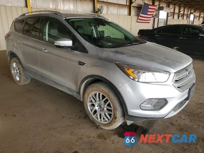 Czwarte zdjęcie samochodu z boku: 2019 FORD ESCAPE TITANIUM VIN:1FMCU0J97KUA35754 - miniatura