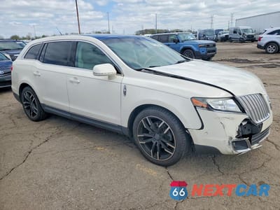 Czwarte zdjęcie samochodu z boku: 2012 LINCOLN MKT VIN:2LMHJ5AT0CBL51533 - miniatura