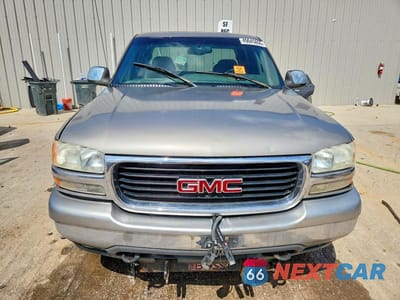 Piąte zdjęcie samochodu w środku: 1999 GMC NEW SIERRA K1500 VIN:1GTEK19T1XE501477 - miniatura