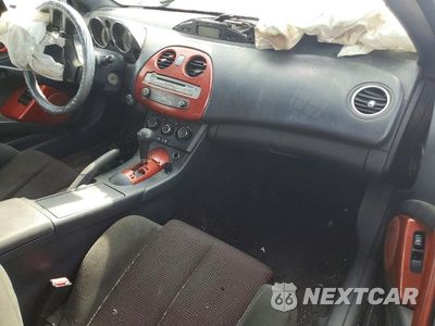 Zdjęcie 15 z 24 samochodu: 2009 MITSUBISHI ECLIPSE VIN:4A3AL25F89E010311 - miniatura