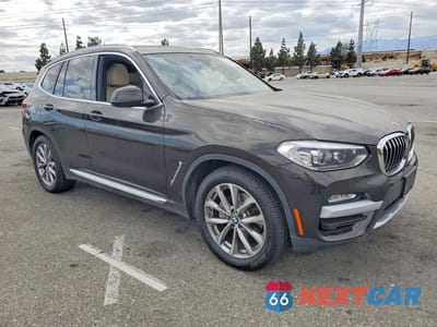 Czwarte zdjęcie samochodu z boku: 2019 BMW X3 SDRIVE30I VIN:5UXTR7C59KLE98012 - miniatura