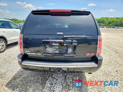 Zdjęcie 6 z 13 samochodu: 2010 GMC YUKON XL DENALI VIN:1GKUKMEF8AR231147 - miniatura